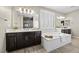 Bathroom with double sinks, soaking tub, and ample counter space at 3428 Royal Calloway Ave, Las Vegas, NV 89141