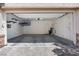Spacious garage with ample storage and organization options for tools and equipment at 3428 Royal Calloway Ave, Las Vegas, NV 89141