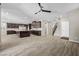 Spacious open-concept living area blends kitchen and living spaces, perfect for entertaining at 3428 Royal Calloway Ave, Las Vegas, NV 89141