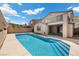 Back of the home and private pool area offers a relaxing outdoor retreat at 3428 Royal Calloway Ave, Las Vegas, NV 89141