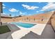 Backyard showcasing the sparkling private pool and outdoor lounging space at 3428 Royal Calloway Ave, Las Vegas, NV 89141