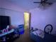 Pink bedroom with ceiling fan and closet, in need of decluttering at 3505 W Bonanza Rd, Las Vegas, NV 89107