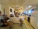 A vintage kitchen with a center island, retro chairs, and classic appliances at 3505 W Bonanza Rd, Las Vegas, NV 89107