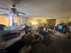 An open-concept living room featuring a vintage brick fireplace and neutral carpeting throughout at 3505 W Bonanza Rd, Las Vegas, NV 89107