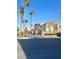 Exterior view of the community showcasing well-maintained buildings, lush landscaping, and inviting signage at 3672 Angela Robin St # 202, Las Vegas, NV 89129