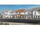 Beautiful new home exteriors, featuring desert landscaping and a terracotta roof at 3759 Via Allegro, Henderson, NV 89044