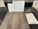 Interior design scheme featuring flooring, white cabinets, quartz counters and chrome faucet at 3759 Via Allegro, Henderson, NV 89044