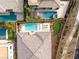 An aerial view shows a property with a modern pool, putting green, and desert landscaping at 39 Cranberry Cove Ct, Las Vegas, NV 89135