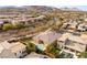 Expansive aerial view of a home featuring a private pool and beautifully landscaped surroundings at 39 Cranberry Cove Ct, Las Vegas, NV 89135