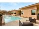 Inviting backyard pool with lounge seating and well-manicured landscaping at 39 Cranberry Cove Ct, Las Vegas, NV 89135