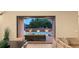 View of a private backyard with a pool and outdoor seating area, perfect for outdoor living at 39 Cranberry Cove Ct, Las Vegas, NV 89135