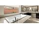 Large soaking tub situated between the and vanities in primary bath at 39 Cranberry Cove Ct, Las Vegas, NV 89135