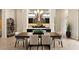 Elegant dining area featuring a modern chandelier, seamlessly connected to the kitchen at 39 Cranberry Cove Ct, Las Vegas, NV 89135