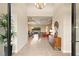 Open concept foyer leads to formal living area with tile floors and recessed lighting at 39 Cranberry Cove Ct, Las Vegas, NV 89135
