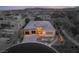 Picture of a modern house with a three-car garage, desert landscaping and a circular driveway on a corner lot at 39 Cranberry Cove Ct, Las Vegas, NV 89135