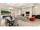 Open concept living room and dining area with access to the pool at 39 Cranberry Cove Ct, Las Vegas, NV 89135