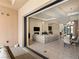 Seamless indoor-outdoor living with access to a covered patio and open concept living room at 39 Cranberry Cove Ct, Las Vegas, NV 89135