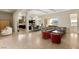 Spacious living area features recessed lights, tile flooring and open floor plan at 39 Cranberry Cove Ct, Las Vegas, NV 89135