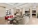 Open concept living space featuring tile flooring, recessed lighting, and modern furnishings at 39 Cranberry Cove Ct, Las Vegas, NV 89135