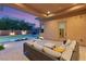 Inviting outdoor patio featuring a comfortable seating area with access to a sparkling swimming pool at 39 Cranberry Cove Ct, Las Vegas, NV 89135