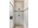 Contemporary tiled shower with rain shower head and tiled floor at 39 Cranberry Cove Ct, Las Vegas, NV 89135