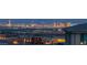 Stunning Las Vegas city skyline view at night from a neighborhood rooftop at 440 Point Sur Ave, Las Vegas, NV 89138