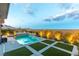 Relaxing backyard featuring a pool, spa, and outdoor seating area at 440 Point Sur Ave, Las Vegas, NV 89138