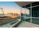 Condo balcony featuring views of the city skyline and beautiful sunset at 4575 Dean Martin Dr # 1605, Las Vegas, NV 89103