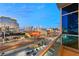 Stunning balcony view of the vibrant cityscape, highway, and neighboring buildings with long exposure light trails at 4575 Dean Martin Dr # 1605, Las Vegas, NV 89103
