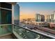 Condo balcony with panoramic city views and modern glass railing at 4575 Dean Martin Dr # 1605, Las Vegas, NV 89103