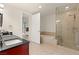 Modern bathroom featuring a glass-enclosed shower, a soaking tub, and contemporary fixtures at 4575 Dean Martin Dr # 1605, Las Vegas, NV 89103