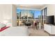 Bright bedroom with a functional workspace and breathtaking cityscape views at 4575 Dean Martin Dr # 1605, Las Vegas, NV 89103