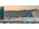Panoramic city view with the mountains in the background, showcasing the roller coaster at Excalibur Hotel at 4575 Dean Martin Dr # 1605, Las Vegas, NV 89103