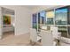 Dining area featuring modern furniture and large windows, offering stunning city skyline views at 4575 Dean Martin Dr # 1605, Las Vegas, NV 89103