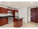 Modern kitchen equipped with stainless steel appliances, dark countertops, and a functional island for meal preparation at 4575 Dean Martin Dr # 1605, Las Vegas, NV 89103