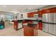 Modern kitchen with stainless steel appliances, dark countertops, and stylish cabinetry offering ample storage at 4575 Dean Martin Dr # 1605, Las Vegas, NV 89103