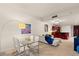 Bright and open living area with contemporary furnishings, a stylish kitchen bar, and ample space for dining at 4575 Dean Martin Dr # 1605, Las Vegas, NV 89103
