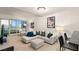 Bright living room with a chandelier, comfortable seating, and expansive windows offering city views at 4575 Dean Martin Dr # 1605, Las Vegas, NV 89103