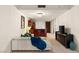 Cozy living area with a kitchen bar, comfortable seating, and contemporary lighting fixtures at 4575 Dean Martin Dr # 1605, Las Vegas, NV 89103