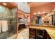 Spa like main bathroom features a walk-in shower, vanity, and a view of the soaking tub and vanity areas at 4775 N Tee Pee Ln, Las Vegas, NV 89129