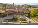 Beautiful exterior view of elegant home with covered parking and manicured front yard, perfect for luxury living at 4775 N Tee Pee Ln, Las Vegas, NV 89129