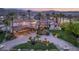 Beautiful front of the home and lush landscaping and a view of a mountain landscape at 4775 N Tee Pee Ln, Las Vegas, NV 89129