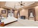 Spacious main bedroom with tray ceiling and large windows at 4775 N Tee Pee Ln, Las Vegas, NV 89129