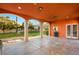 Inviting outdoor patio with columns, a large backyard, and ample space for entertaining and relaxing at 4775 N Tee Pee Ln, Las Vegas, NV 89129