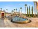 Luxury backyard with a large pool, spa, and lush landscaping, creating a serene and private oasis at 4775 N Tee Pee Ln, Las Vegas, NV 89129