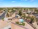 A high angle shot featuring residential homes, swimming pools and desert landscaping at 5217 Cold River Ave, Las Vegas, NV 89130