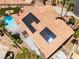 Aerial view of the property highlighting the pool, solar panels and landscaped backyard at 5217 Cold River Ave, Las Vegas, NV 89130