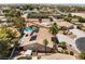 Overhead view showcases the home with solar panels, pool, landscaping, and neighborhood surroundings at 5217 Cold River Ave, Las Vegas, NV 89130