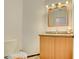 Bathroom featuring a vanity and sink with a toilet on the side at 5217 Cold River Ave, Las Vegas, NV 89130