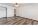 This bedroom features new hardwood flooring and closet space at 5217 Cold River Ave, Las Vegas, NV 89130